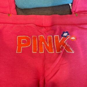 Pink Logo Sweatpants with Floral Accents